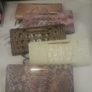 Brahmin flip wallet in pink/purple/gray color